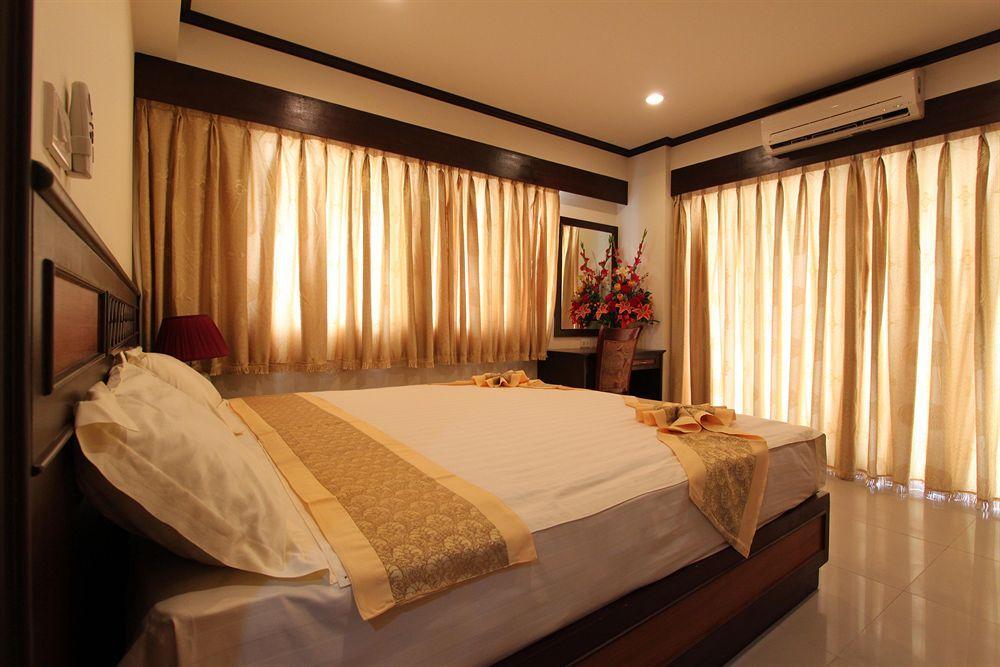 Miloft Sathorn Hotel - Sha Plus Certified Bangkok Kültér fotó A bedroom at the hotel