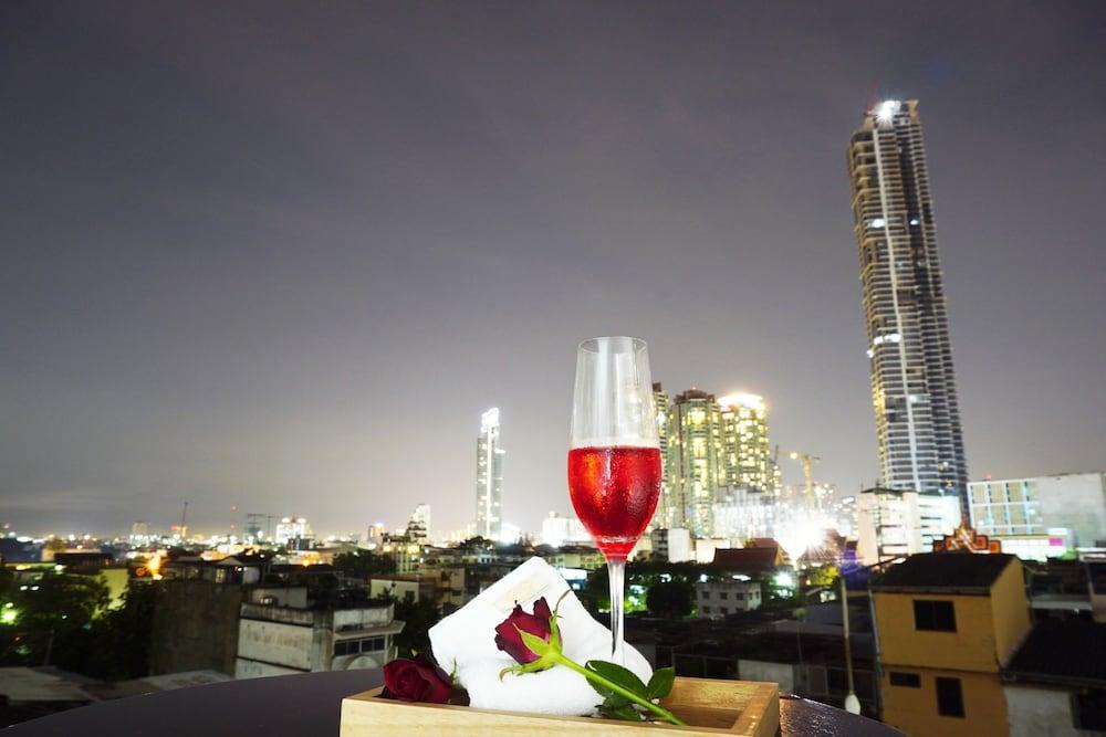 Miloft Sathorn Hotel - Sha Plus Certified Bangkok Kültér fotó View of the complex at night